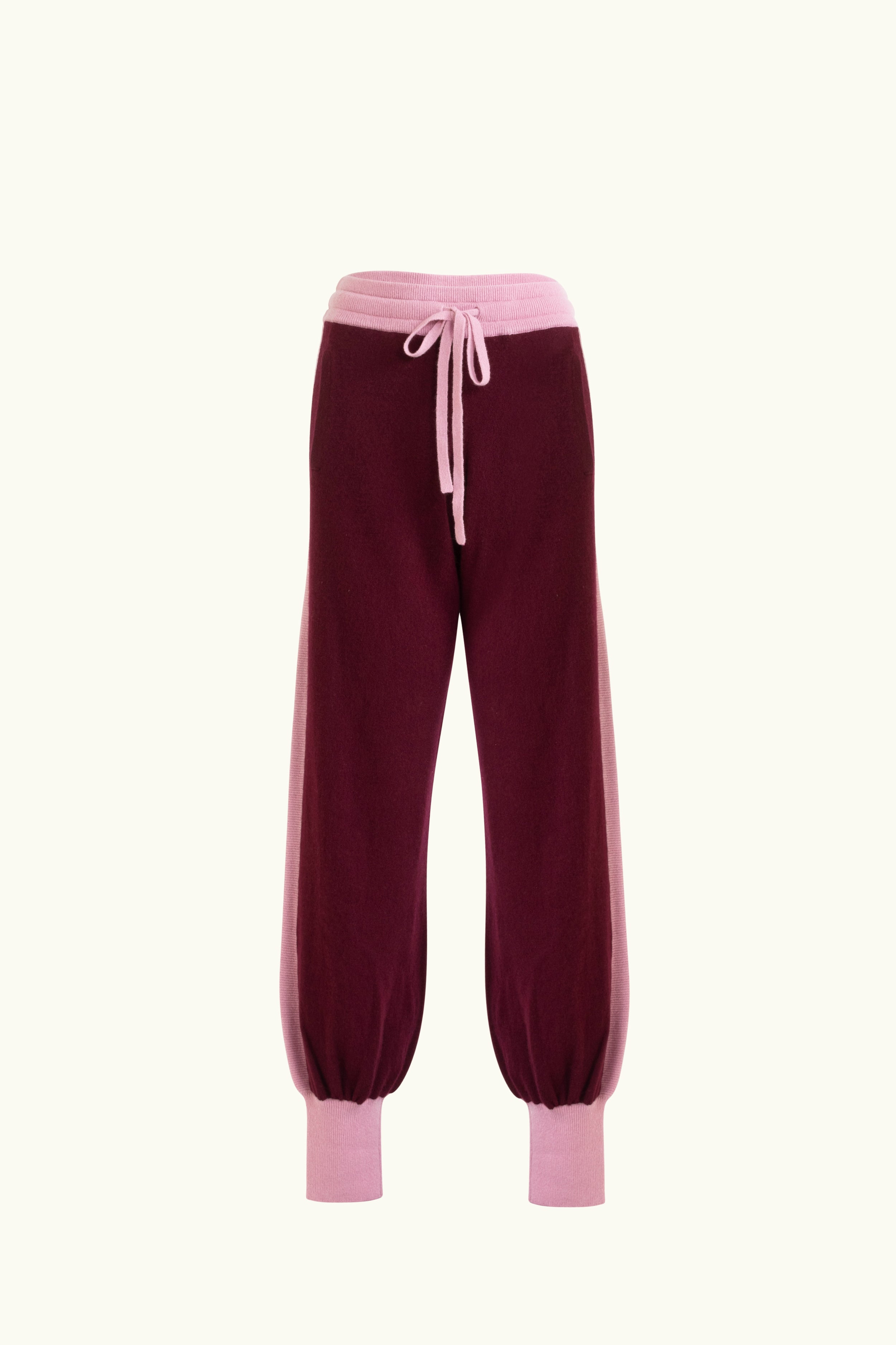Cashmere track pant in an aubergine colour way with a white background