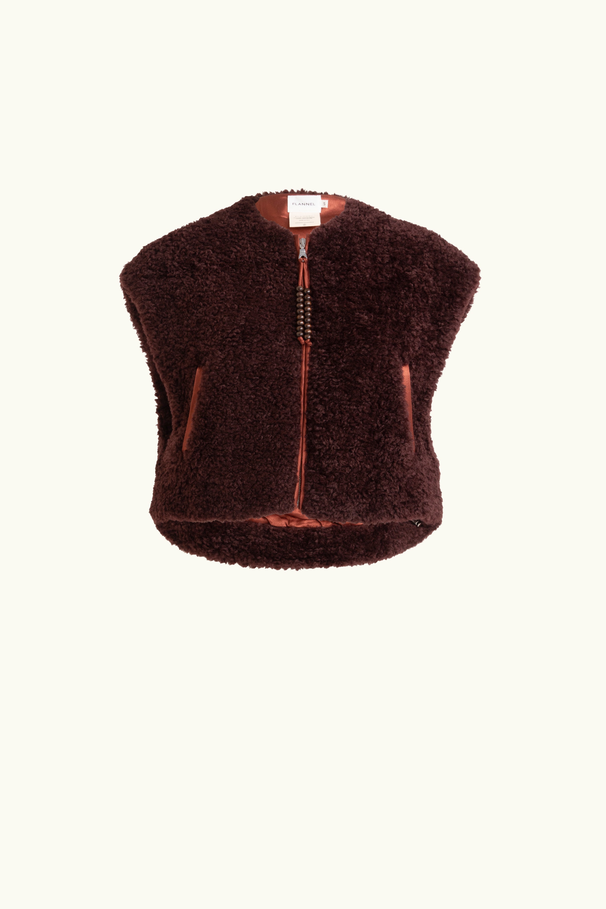 Port coloured faux fur zip up vest on a white background