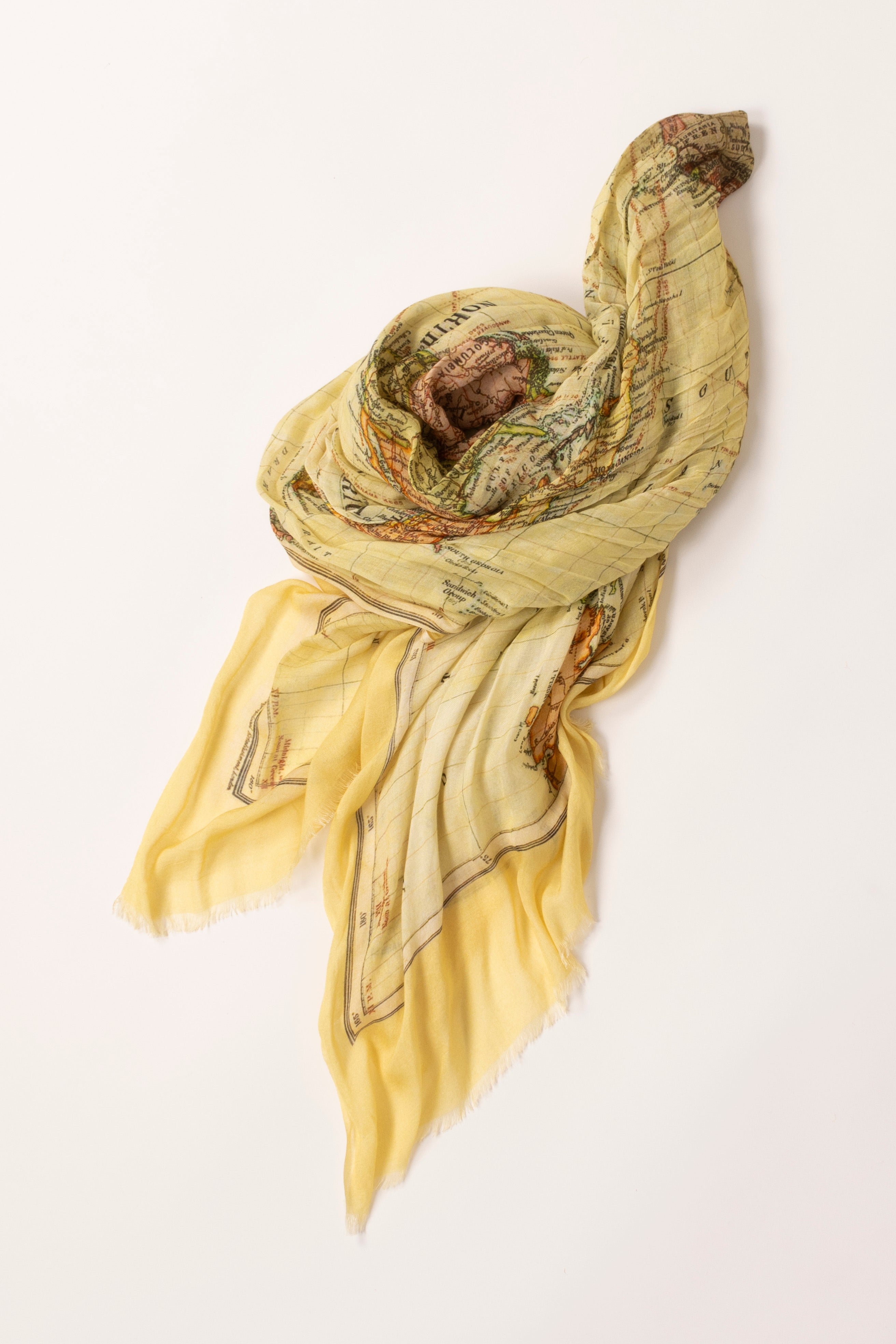 In situ image of scarf draped onto a table.