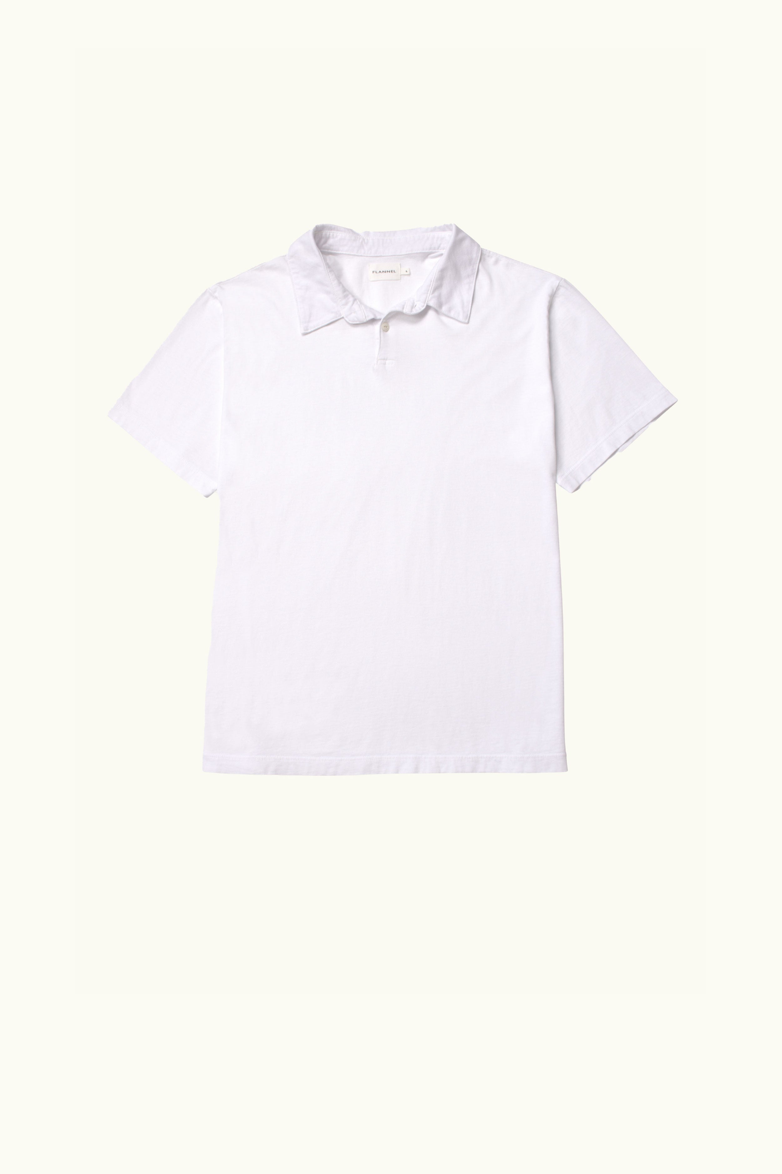 White cotton polo shirt on a white background