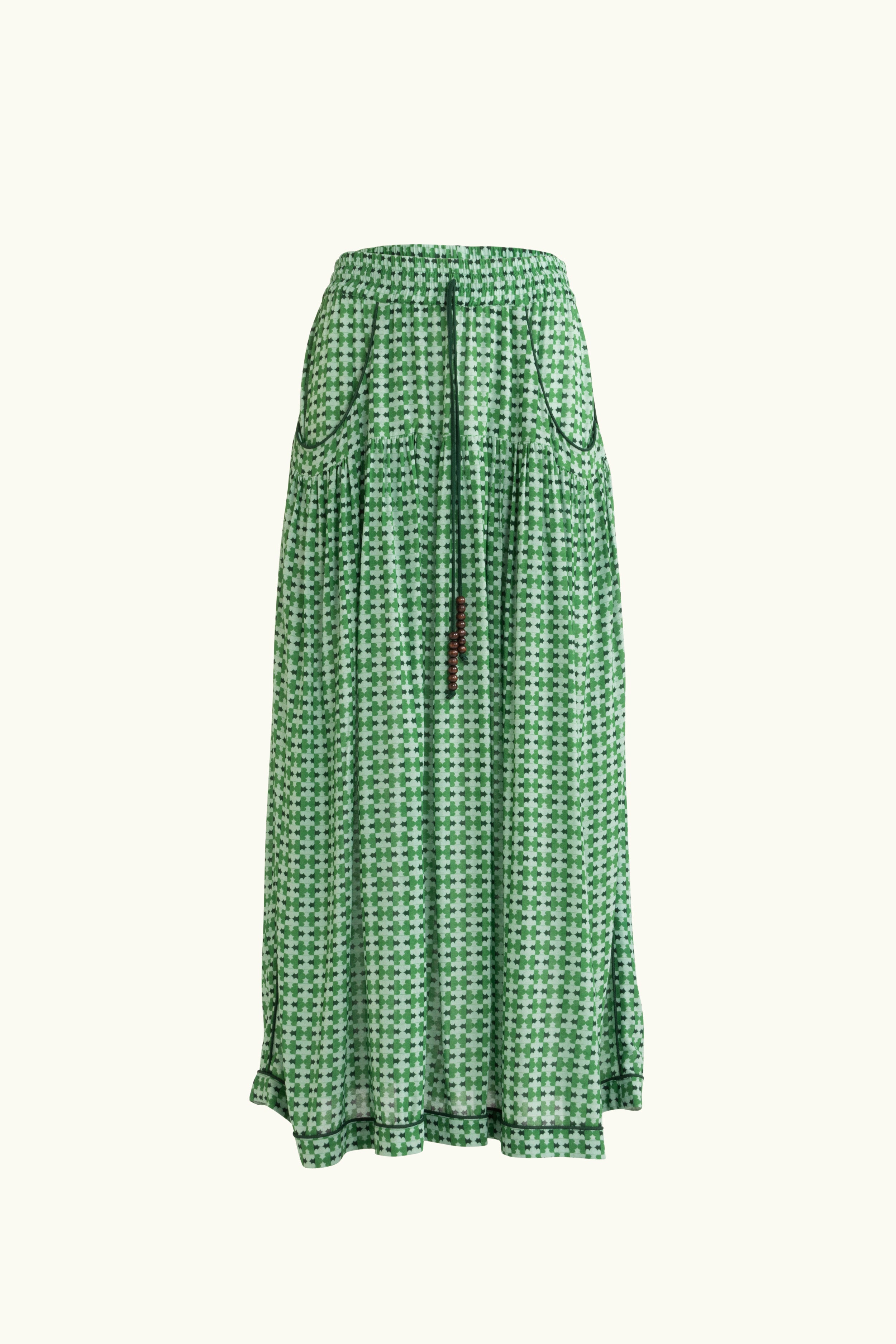 Green patterned skirt on a white background