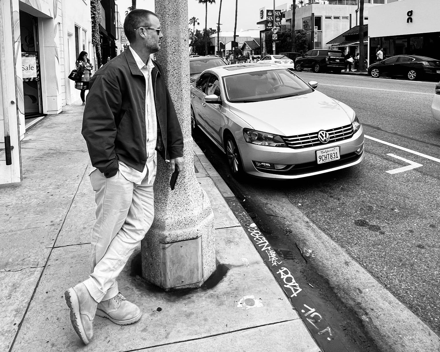 Image of managing director John Lawrence standing on the side of a street. 