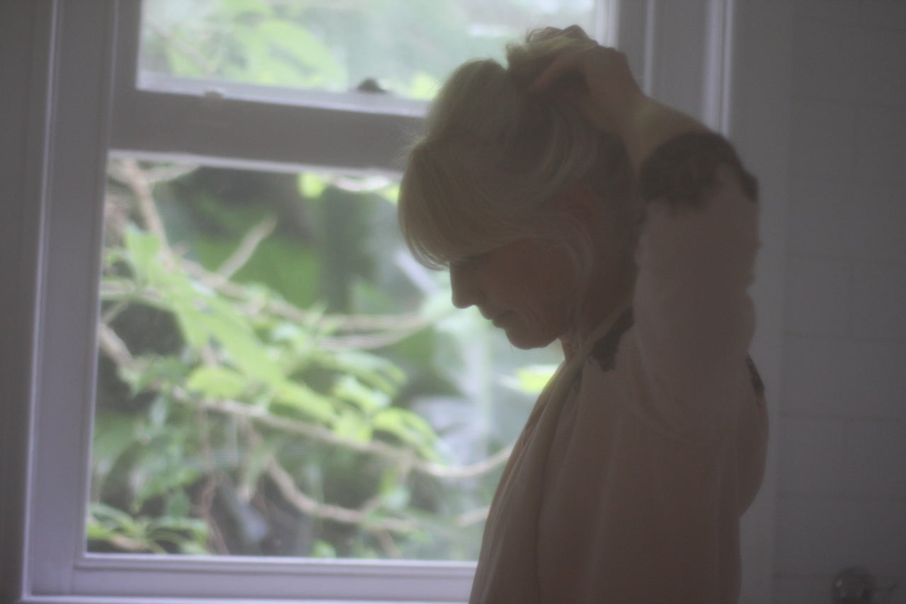 Image of FLANNEL girl wearing archive pieces. 