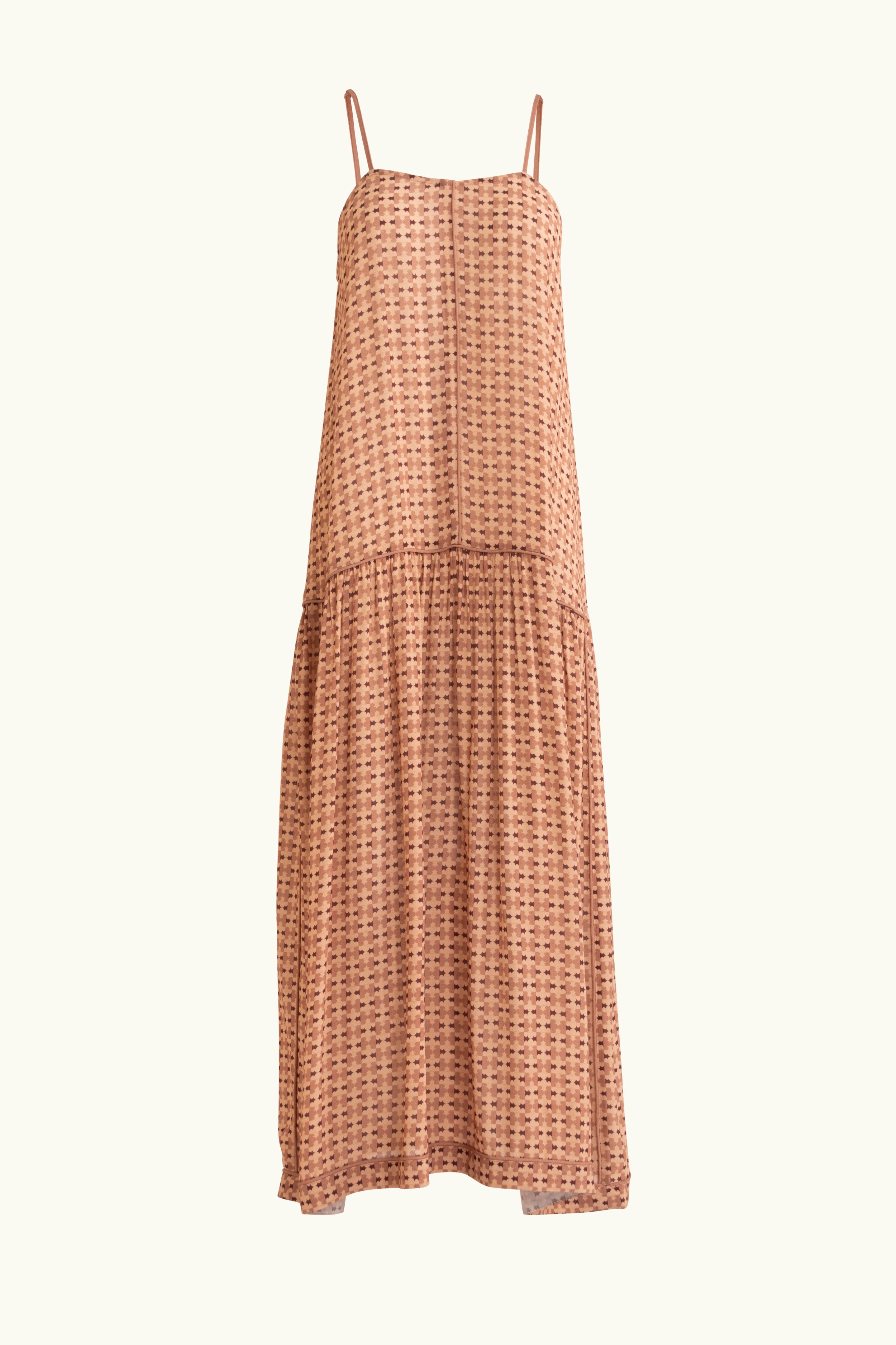 Peach patterned dress on white background